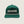 A dark green baseball cap with a white rope detail across the brim and white embroidered text reading 'GODLESS' and 'AIM SMALL MISS SMALL' on the front, shown against a light beige background.